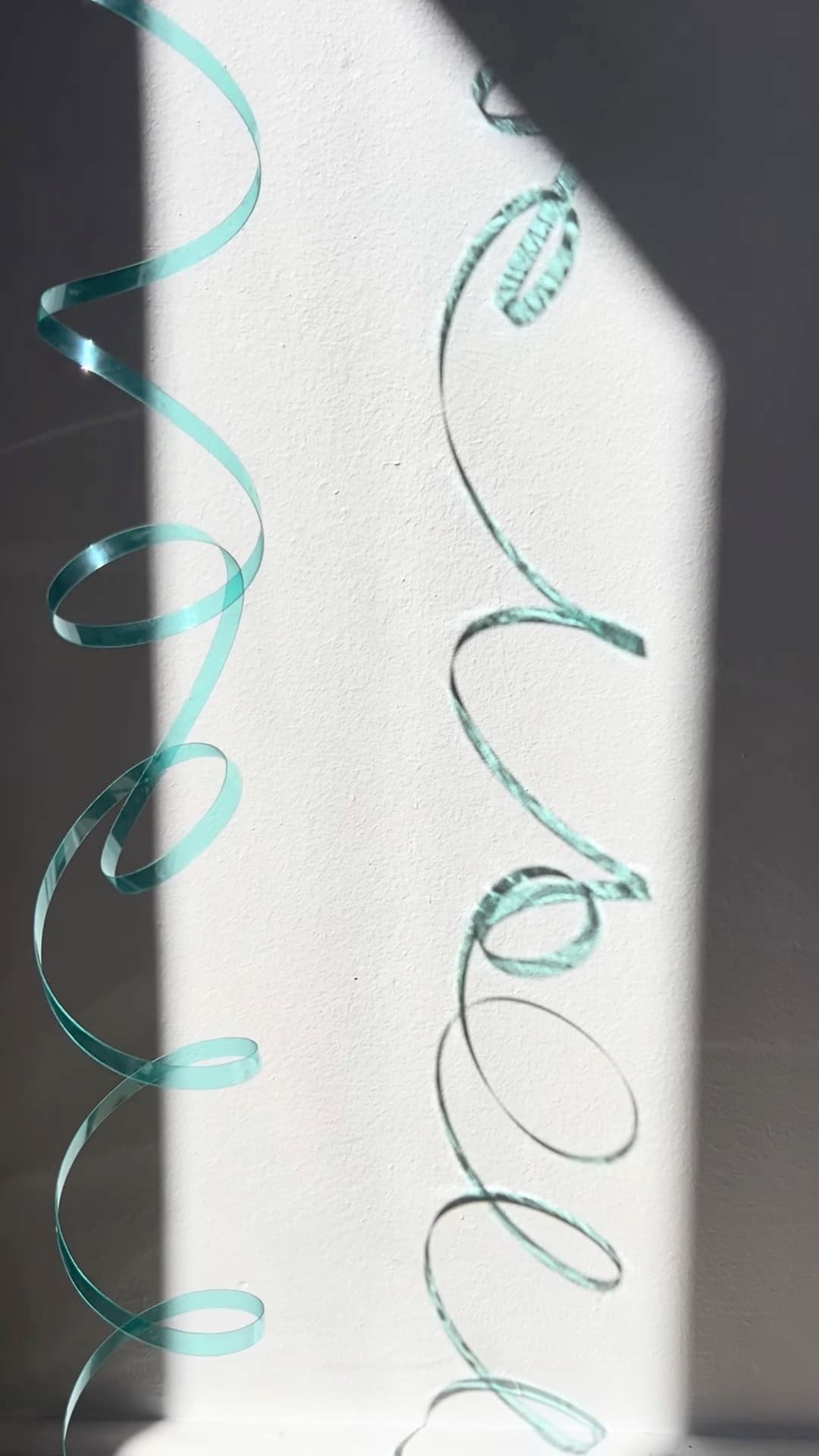 A single helical strip cut from a bottle